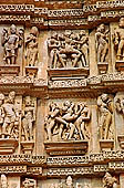 Khajuraho - Visvanatha temple - mithuna, embracing couple, a common motif on the walls of Hindu temples 